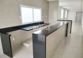 Foto 1 de Casa com 4 Quartos à venda, 210m² em Cidade Jardim, Uberlândia