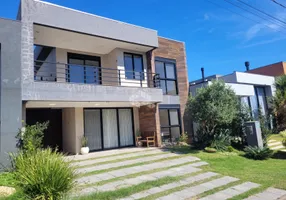 Foto 1 de Casa de Condomínio com 4 Quartos à venda, 251m² em Centro, Xangri-lá