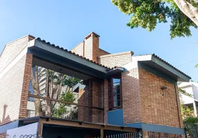 Foto 1 de Casa com 3 Quartos à venda, 262m² em Auxiliadora, Porto Alegre