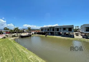 Foto 1 de Casa de Condomínio com 4 Quartos à venda, 168m² em Zona Nova, Capão da Canoa