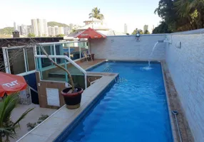 Foto 1 de Casa com 4 Quartos à venda, 250m² em Canto do Forte, Praia Grande