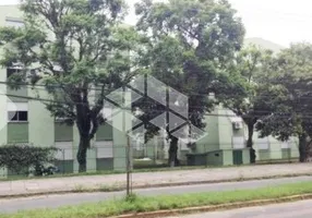 Foto 1 de Apartamento com 3 Quartos à venda, 59m² em Vila Nova, Porto Alegre