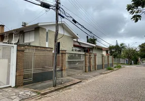 Foto 1 de Casa com 3 Quartos à venda, 218m² em Jardim Lindóia, Porto Alegre