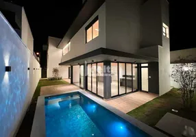 Foto 1 de Casa de Condomínio com 4 Quartos à venda, 254m² em Gávea Sul, Uberlândia