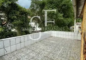 Foto 1 de Casa com 5 Quartos à venda, 165m² em Rio Comprido, Rio de Janeiro