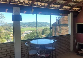 Foto 1 de Casa com 3 Quartos à venda, 140m² em Ponta das Canas, Florianópolis