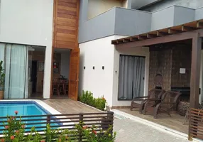 Foto 1 de Casa de Condomínio com 4 Quartos à venda, 141m² em Barra do Jacuípe, Camaçari