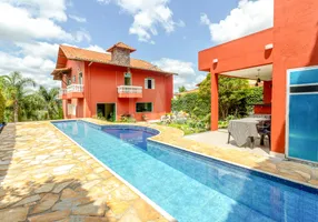 Foto 1 de Casa de Condomínio com 6 Quartos à venda, 500m² em Vila Castela , Nova Lima