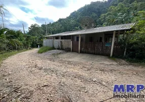 Foto 1 de Casa com 4 Quartos à venda, 100m² em Ubatuba, Ubatuba