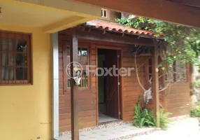 Foto 1 de Casa com 4 Quartos à venda, 115m² em Vila Ipiranga, Porto Alegre