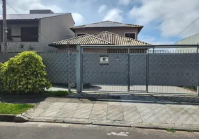 Foto 1 de Casa com 5 Quartos à venda, 156m² em Hípica, Porto Alegre