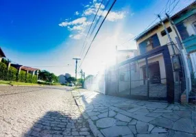 Foto 1 de Casa de Condomínio com 3 Quartos à venda, 109m² em Serraria, Porto Alegre