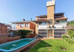 Foto 1 de Casa com 4 Quartos à venda, 349m² em Tristeza, Porto Alegre
