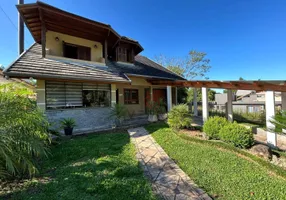 Foto 1 de Casa de Condomínio com 3 Quartos à venda, 205m² em Vivendas do Arvoredo, Gramado