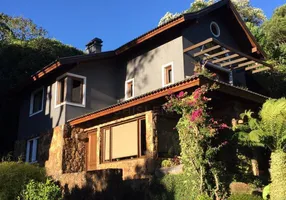 Foto 1 de Casa de Condomínio com 4 Quartos à venda, 298m² em Saint Moritz, Gramado