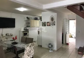 Foto 1 de Casa de Condomínio com 3 Quartos à venda, 77m² em Santa Fé, Porto Alegre