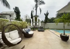 Foto 1 de Casa de Condomínio com 5 Quartos para alugar, 300m² em Barra da Tijuca, Rio de Janeiro