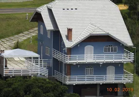 Foto 1 de Casa de Condomínio com 5 Quartos à venda, 224m² em Alpes Campos do Jordao, Campos do Jordão