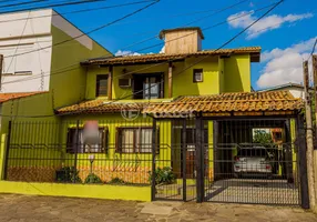 Foto 1 de Casa com 3 Quartos à venda, 239m² em Santa Fé, Porto Alegre