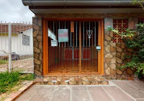 Foto 1 de Casa com 4 Quartos à venda, 200m² em Restinga, Porto Alegre