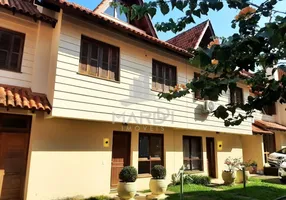 Foto 1 de Casa de Condomínio com 3 Quartos para alugar, 132m² em Espiríto Santo, Porto Alegre