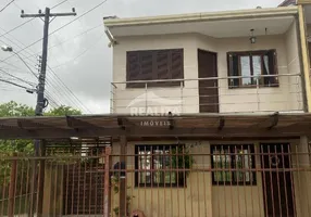 Foto 1 de Casa com 3 Quartos à venda, 95m² em Krahe, Viamão