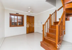 Foto 1 de Casa de Condomínio com 2 Quartos à venda, 58m² em Camaquã, Porto Alegre