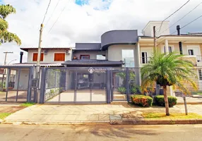 Foto 1 de Casa de Condomínio com 4 Quartos à venda, 216m² em Alto Petrópolis, Porto Alegre