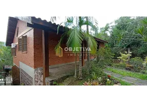 Foto 1 de Casa com 2 Quartos à venda, 210m² em Vila Nova, Porto Alegre