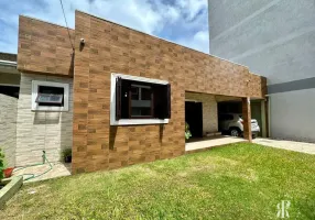 Foto 1 de Casa com 5 Quartos à venda, 217m² em Centro, Tramandaí