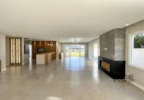 Foto 1 de Casa de Condomínio com 3 Quartos à venda, 301m² em Alphaville, Porto Alegre