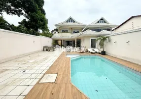 Foto 1 de Casa com 5 Quartos à venda, 370m² em Barra da Tijuca, Rio de Janeiro