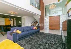 Foto 1 de Casa de Condomínio com 3 Quartos à venda, 270m² em Cavalhada, Porto Alegre