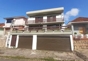 Foto 1 de Casa com 4 Quartos à venda, 240m² em Passo da Areia, Porto Alegre