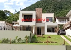 Foto 1 de Casa de Condomínio com 4 Quartos para alugar, 297m² em Lagoinha, Ubatuba