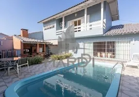 Foto 1 de Casa com 3 Quartos à venda, 256m² em Espiríto Santo, Porto Alegre