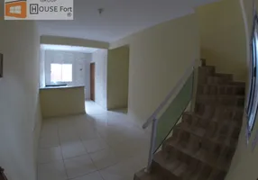 Foto 1 de Sobrado com 2 Quartos à venda, 49m² em Sítio do Campo, Praia Grande