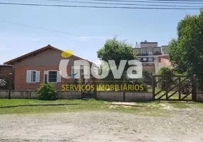 Foto 1 de Sobrado com 4 Quartos à venda, 100m² em Centro, Tramandaí