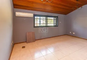 Foto 1 de Casa de Condomínio com 4 Quartos à venda, 282m² em Chácara das Pedras, Porto Alegre