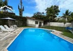 Foto 1 de Casa de Condomínio com 4 Quartos para venda ou aluguel, 450m² em Jardim Acapulco , Guarujá