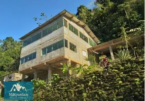 Foto 1 de Casa com 4 Quartos à venda, 3000m² em Parque Caiubura, Bertioga