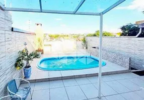 Foto 1 de Casa com 3 Quartos à venda, 67m² em Jardim Algarve, Alvorada