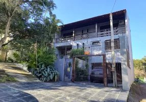 Foto 1 de Casa com 4 Quartos à venda, 308m² em Cristal, Porto Alegre