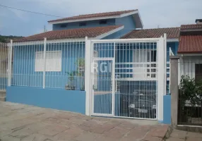 Foto 1 de Casa com 4 Quartos à venda, 183m² em Jardim Carvalho, Porto Alegre