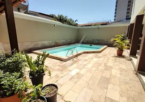 Foto 1 de Casa de Condomínio com 4 Quartos à venda, 459m² em Mata da Praia, Vitória