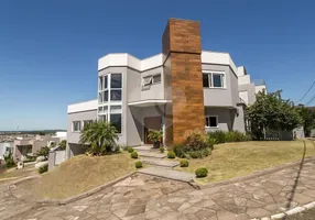 Foto 1 de Casa de Condomínio com 3 Quartos à venda, 440m² em Aberta dos Morros, Porto Alegre