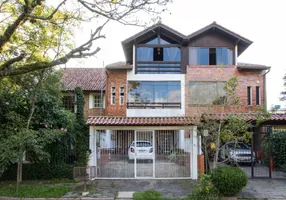 Foto 1 de Casa com 3 Quartos à venda, 180m² em Guarujá, Porto Alegre