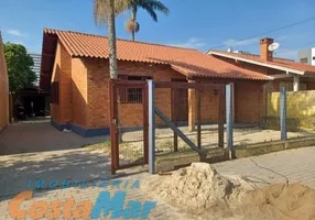 Foto 1 de Casa com 3 Quartos à venda, 120m² em Centro, Tramandaí