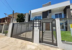 Foto 1 de Casa com 4 Quartos à venda, 234m² em Marechal Rondon, Canoas