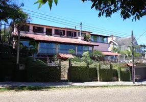 Foto 1 de Casa com 5 Quartos à venda, 580m² em Vila Conceição, Porto Alegre